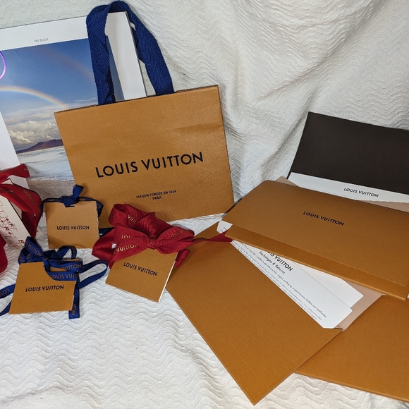 Louis Vuitton shopping bags, tags, and magazine - Picture 3 of 4